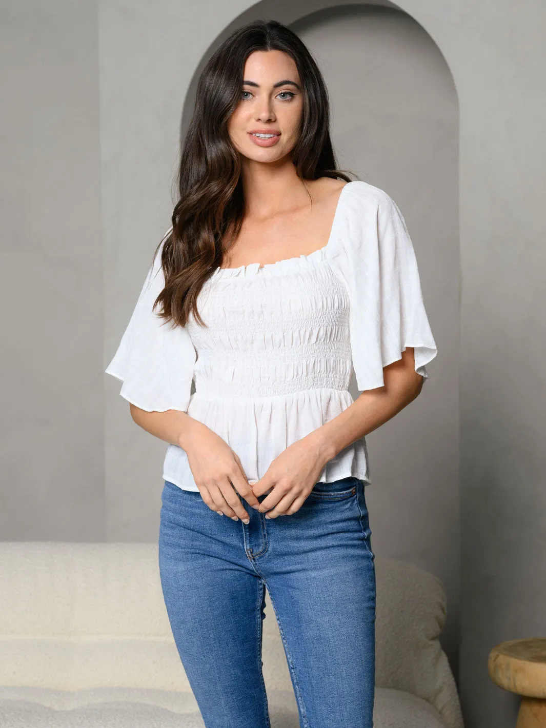 WOMEN'S SHORT SELEEVE RUFFLE SMOCK TOP